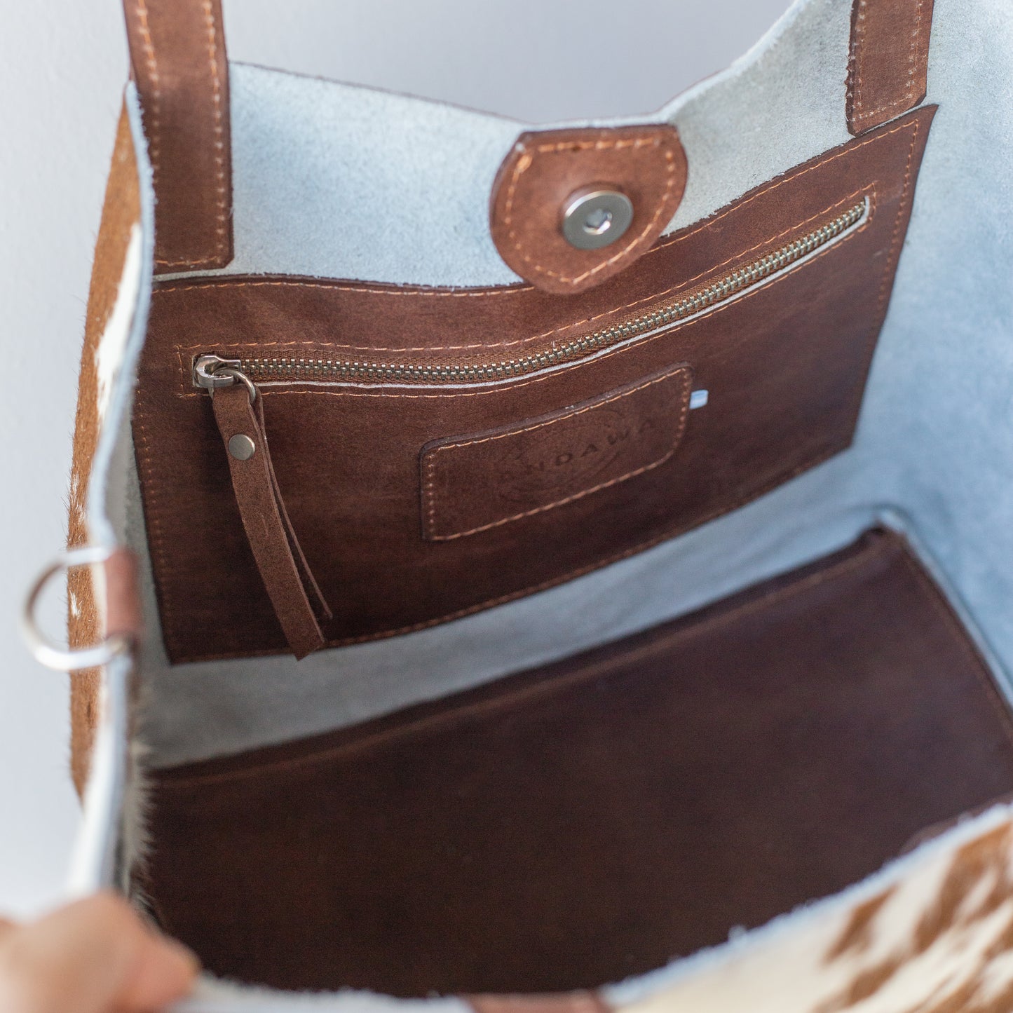 Cartera Candida pelo